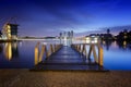 Modern wooden jetty near the lakeside during blue hour image at Putrajaya , Malaysia.