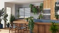 Modern wooden kitchen in white and blue tones with island and chairs. Biophilic concept, many houseplants. Urban jungle interior Royalty Free Stock Photo