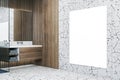 Modern wooden and marble tile bathroom interior with empty white mock up banner on wall and mirror. Royalty Free Stock Photo