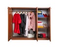 Modern wooden wardrobe with clothes and shoes Royalty Free Stock Photo