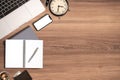 Modern work place wooden desk in office , Top view flat lay of stationary laptop computer  and notebook memo with copy space Royalty Free Stock Photo