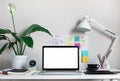 Modern work table with blank computer laptop and accessories in home office studio.Freelance designer or blogger concepts ideas Royalty Free Stock Photo