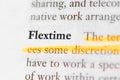 modern workforce benefit term, flextime focused in closeup of explanation