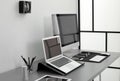 Modern workplace interior with computers on table. Royalty Free Stock Photo