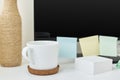 Modern workspace background. Workplace with a cup of coffee, office supplies and sticky notes on table Royalty Free Stock Photo
