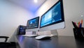 Modern Workspace with Dual Monitors and Computer Tower on Minimalist Desk Royalty Free Stock Photo