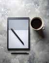 Modern Workspace with EInk Tablet and Coffee Royalty Free Stock Photo