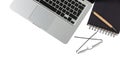 Modern workspace, laptop and black notepad on white background, copy space, top view