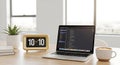 Modern Workspace: Laptop with Code, Coffee, and Retro Clock Royalty Free Stock Photo