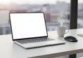 Modern Workspace with Laptop and Coffee Royalty Free Stock Photo