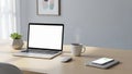 Modern Workspace with Laptop, Coffee, and Wireless Charging Royalty Free Stock Photo