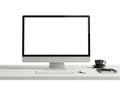 Modern workspace setup with computer and coffee Royalty Free Stock Photo