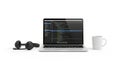 Modern workspace setup laptop headphones and coffee mug for productivity and concentration Royalty Free Stock Photo