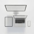 Modern workspace setup with multiple devices Royalty Free Stock Photo