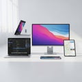 Modern workspace setup with multiple devices Royalty Free Stock Photo