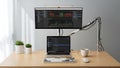 A modern workstation featuring a monitor laptop and coding setup Royalty Free Stock Photo