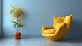 Modern yellow armchair stands out against a blue wall, providing ample space for text or design elements Royalty Free Stock Photo