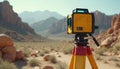 Modern yellow laser leveling device on tripod outdoors. Precision equipment measures terrain for land survey, mapping, Royalty Free Stock Photo