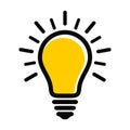 Modern yellow light bulb icon with rays. Idea and creativity symbol isolated on a white background.