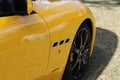 Yellow modern Maserati side details closeup