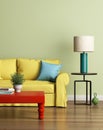 Modern yellow sofa in a light green luxury interior Royalty Free Stock Photo