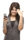 Modern young girl with the cell phone Royalty Free Stock Photo