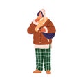 Modern young man in winter apparel, warm hat and jacket, scarf. Trendy stylish guy wearing fashion outfit, casual