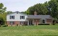 Modest Split-level Ranch Home with Large Lawn