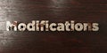 Modifications - grungy wooden headline on Maple - 3D rendered royalty free stock image