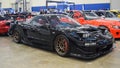 Modified black Honda NSX in the Elite showcase indoor car show