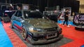 Modified black Mitsubishi Lancer Evolution VIII sedan on display at Indonesia Modification Expo 2023