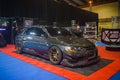 Modified black Mitsubishi Lancer Evolution VIII sedan on display at Indonesia Modification Expo 2023