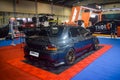 Modified black Mitsubishi Lancer Evolution VIII sedan on display at Indonesia Modification Expo 2023