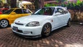 Modified Honda Civic Type R EK9 hatchback in a car meet