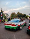 Modified Nissan 200SX S13 on parking lot during afternoon sunset