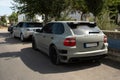 Modified Porsche Cayenne in a street under the sunlight