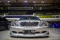 Modified silver Mercedes Benz S 320 in car show front view