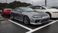 Modified silver Nissan Silvia S15 on the parking lot