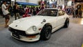 Modified white Nissan Fairlady z or datsun 240z quarter view