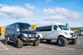 Modified 4x4 mercedes Benz Sprinter minibuses at the parking lot