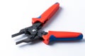 Modular crimping tool for RJ-45, white background, Crimping tool, RJ 45 LAN cable twisting tool. Royalty Free Stock Photo