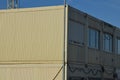 modular housing in stacked container cells. each module has a
