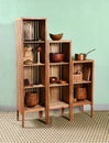 Modular wooden etagere displaying kitchenware Royalty Free Stock Photo