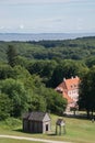 Moesgaard Mansion with old viking stave church, Aarhus, Denmark Royalty Free Stock Photo