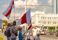 Mogilev, Belarus - August 16, 2020: People at the rally carry flags. Protest against the presidential elections in Belarus 2020