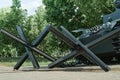 MOGILEV, BELARUS MAY 21 2023 Anti-tank hedgehogs and tank closeup and peaceful background. Monument to old weapons close-up.