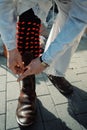 Mohacs, Baranya / Hungary - FEB 26 2017 : traditional participant called buso of the busojaras event tying his shoe