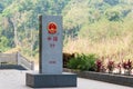 Laos - China border marker between Boten, Luang Namtha Province, Laos and Mohan, Yunnan Province, China.