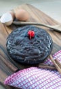 Moist chocolate cake/pie with milk chocolate glaze and cherry Royalty Free Stock Photo