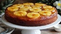 Moist and Fluffy Pineapple Upside Down Cake on White Cake Stand Royalty Free Stock Photo